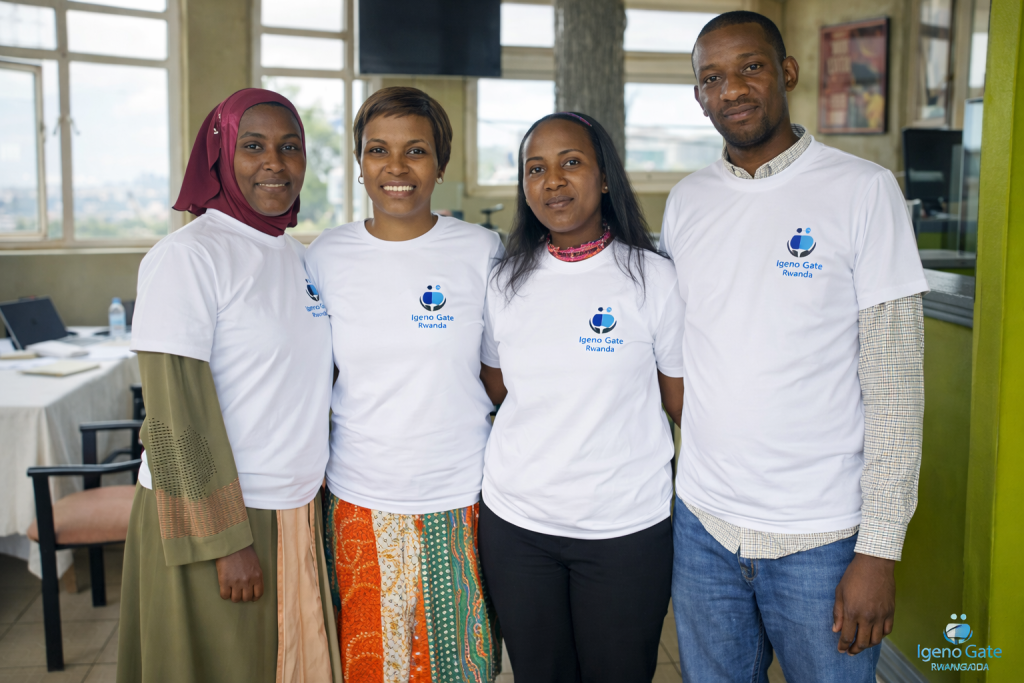 Nurse partners of Igeno Gate Rwanda wearing official branded T-shirts during a coordination meeting.